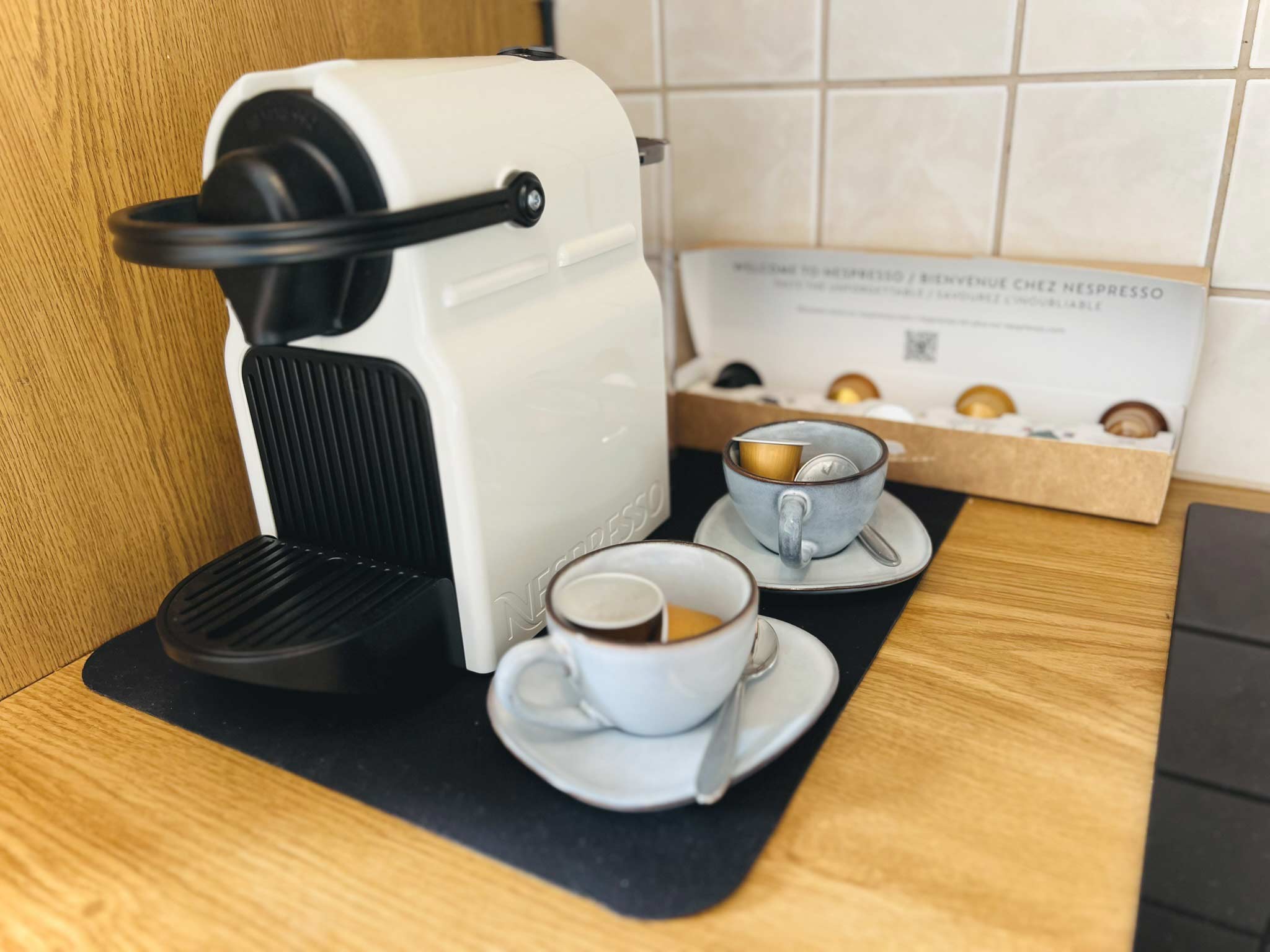 Premium Nespresso machine in the fully equipped kitchen